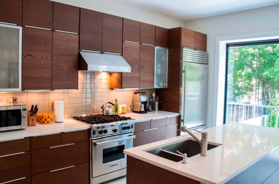 15 - Stainless Steel Range Hood And Sleek Small Island With Sink Idea Also Modern Kitchen Cabinet Design