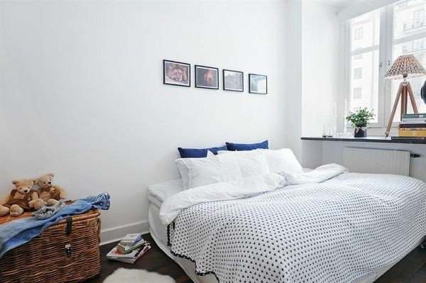 Designed bedrooms in a Scandinavian style white room redness accents