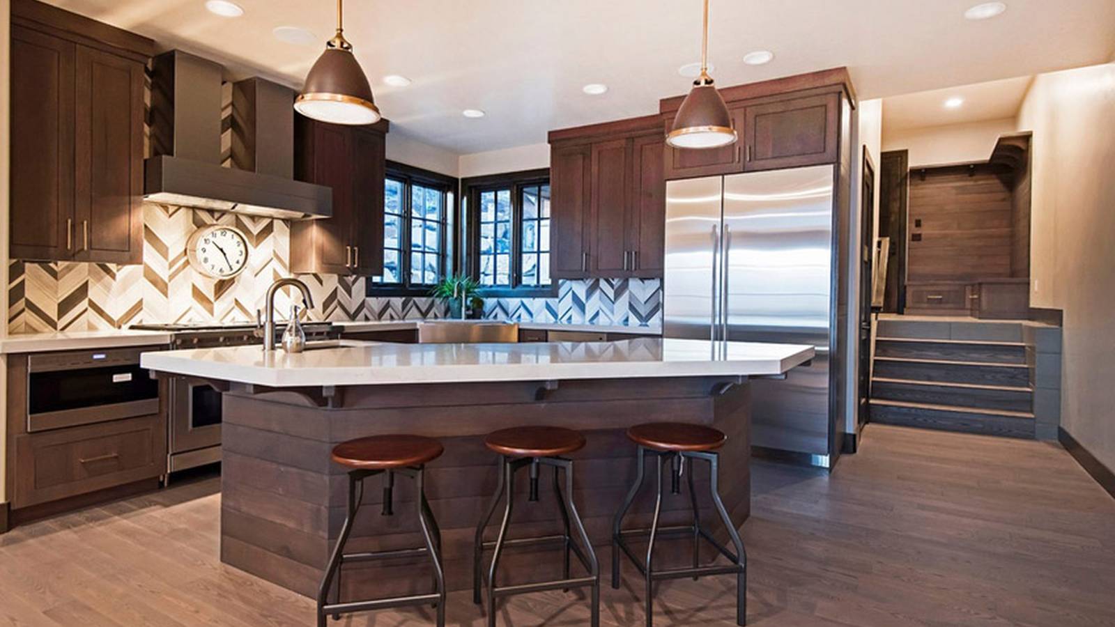 Contemporary kitchen with sink built in island