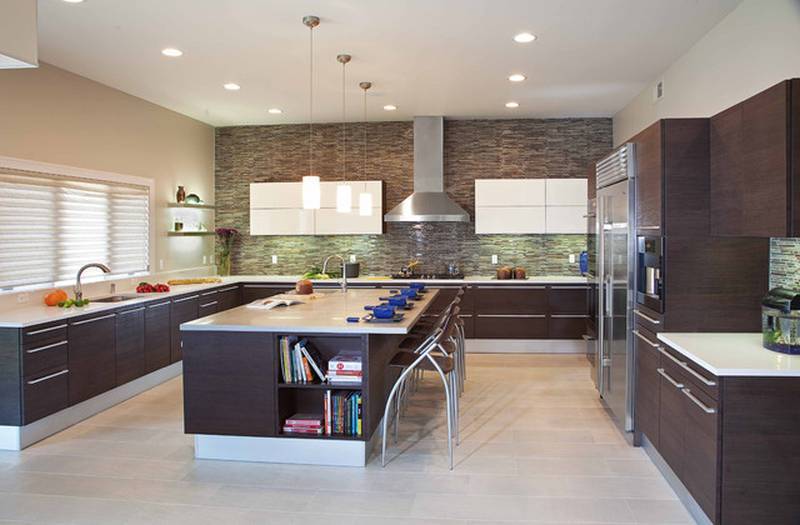 contemporary kitchen with limestone and rich wood cabinetry