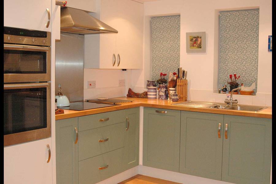 Shaker style country kitchen with hand painted finish and wooden worktop