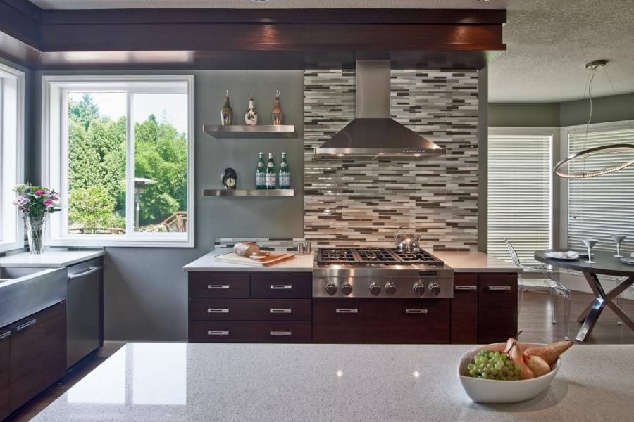 White quartz counter kitchen with dark wood