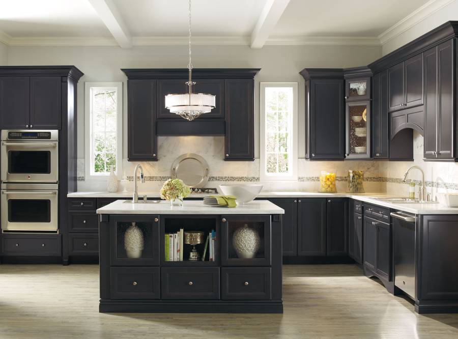 White quartz counter kitchen with dark wood