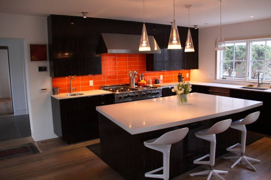 White quartz counter kitchen with dark wood