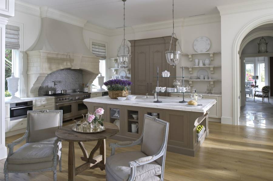 Contemporary kitchen with hardwood floors open to dining room