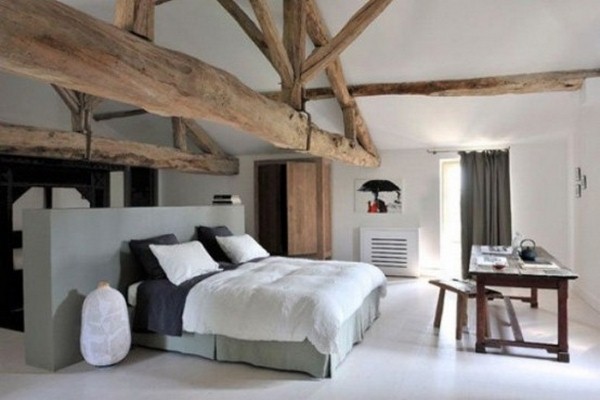 bed white bedroom natural wood beams