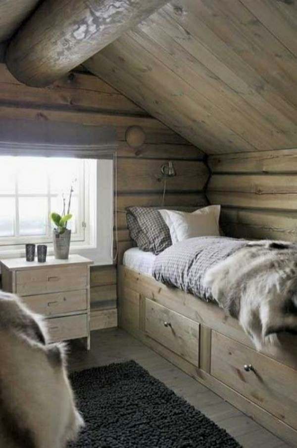 wooden bed in a cabin so little space resized storage under bed