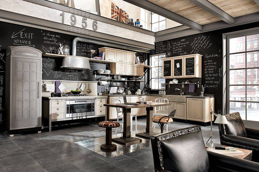 Great vintage industrial kitchen with wall art and small island with chairs