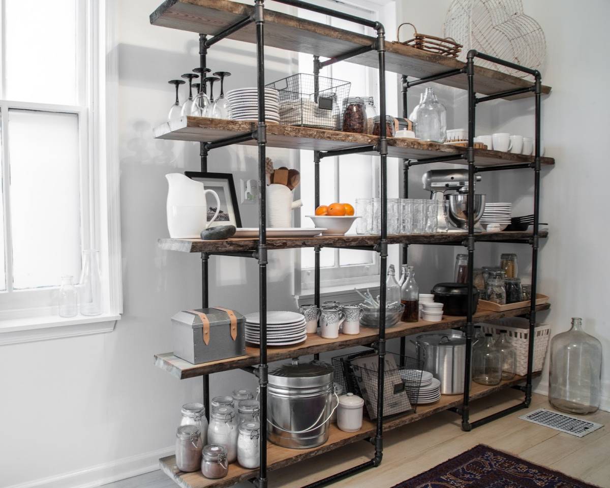 Impressive industrial style kitchen storage made with pipes and rustic shelves