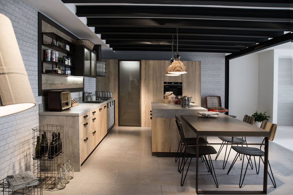 Great and simple urban loft kitchen with ceiling lighting, island and dining area